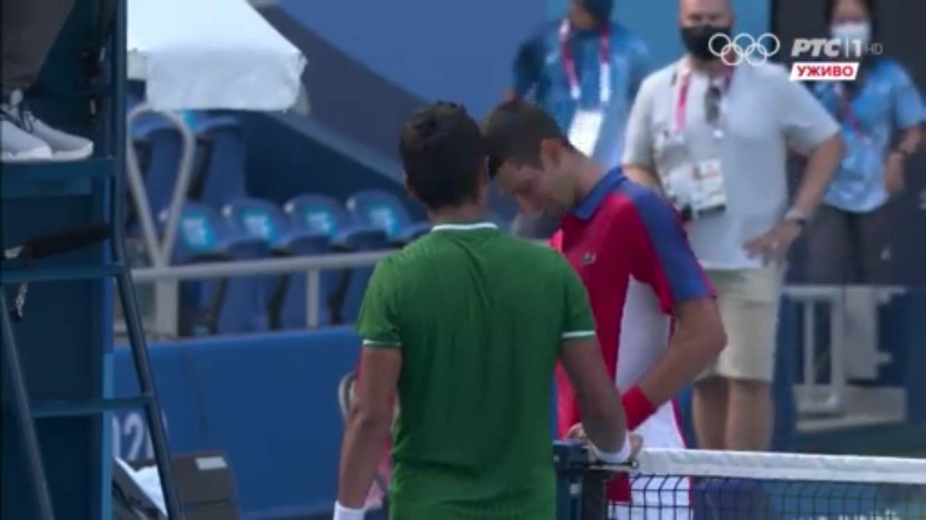 Ugo Delijen i Novak Đoković posle meča na Olimpijskim igrama