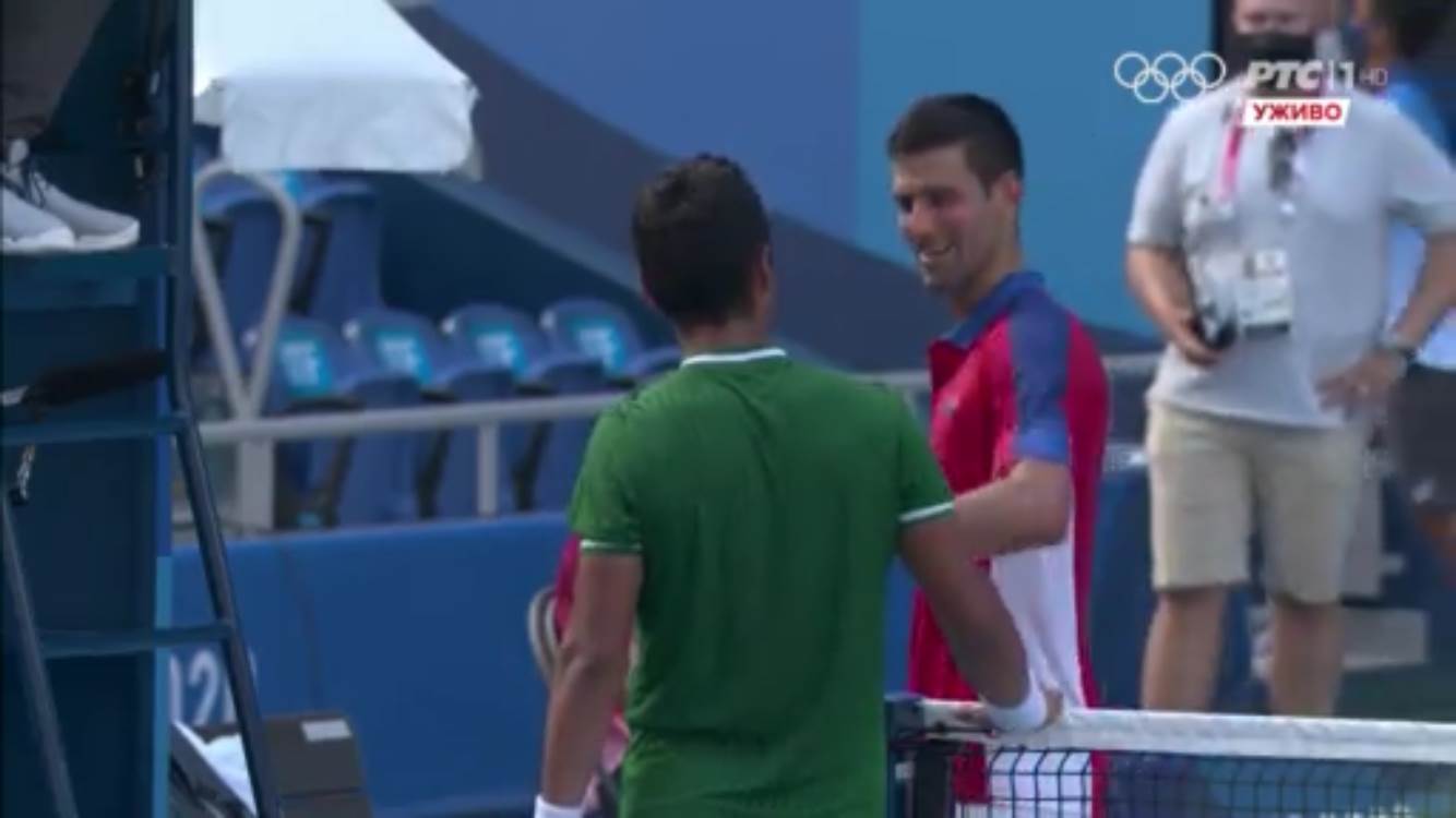 Ugo Delijen i Novak Đoković posle meča na Olimpijskim igrama