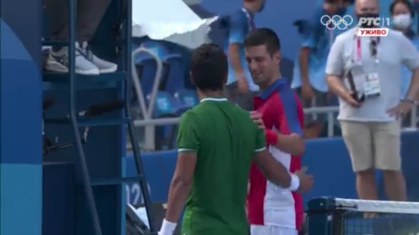 Ugo Delijen i Novak Đoković posle meča na Olimpijskim igrama