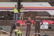 Leš koji čeka na identifikaciju, između dva vagona u oblasti gde traže mladog Kordovana Alvara Priet (2).jpg