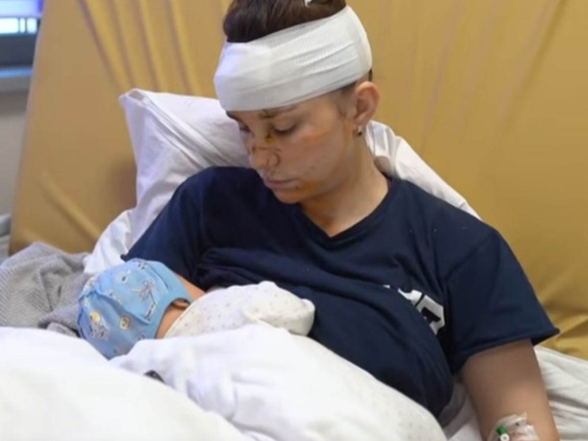 Olga štitla svoju bebu od granatiranja.jpg