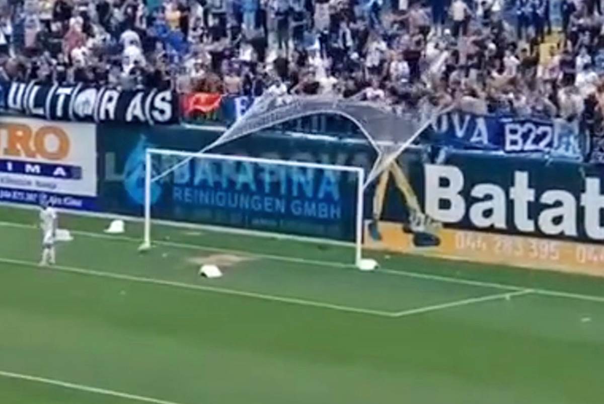 Albanski navijaci cepaju mrezu od gola (3).jpg