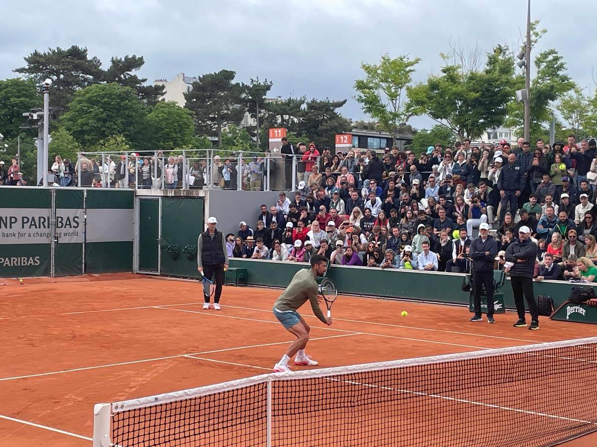 Novak Ðoković trening sa Kristijanom Herisonom 2.jpg