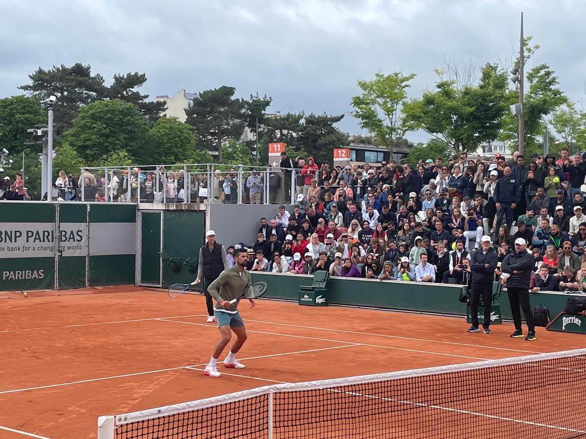 Novak Ðoković trening sa Kristijanom Herisonom 4.jpg