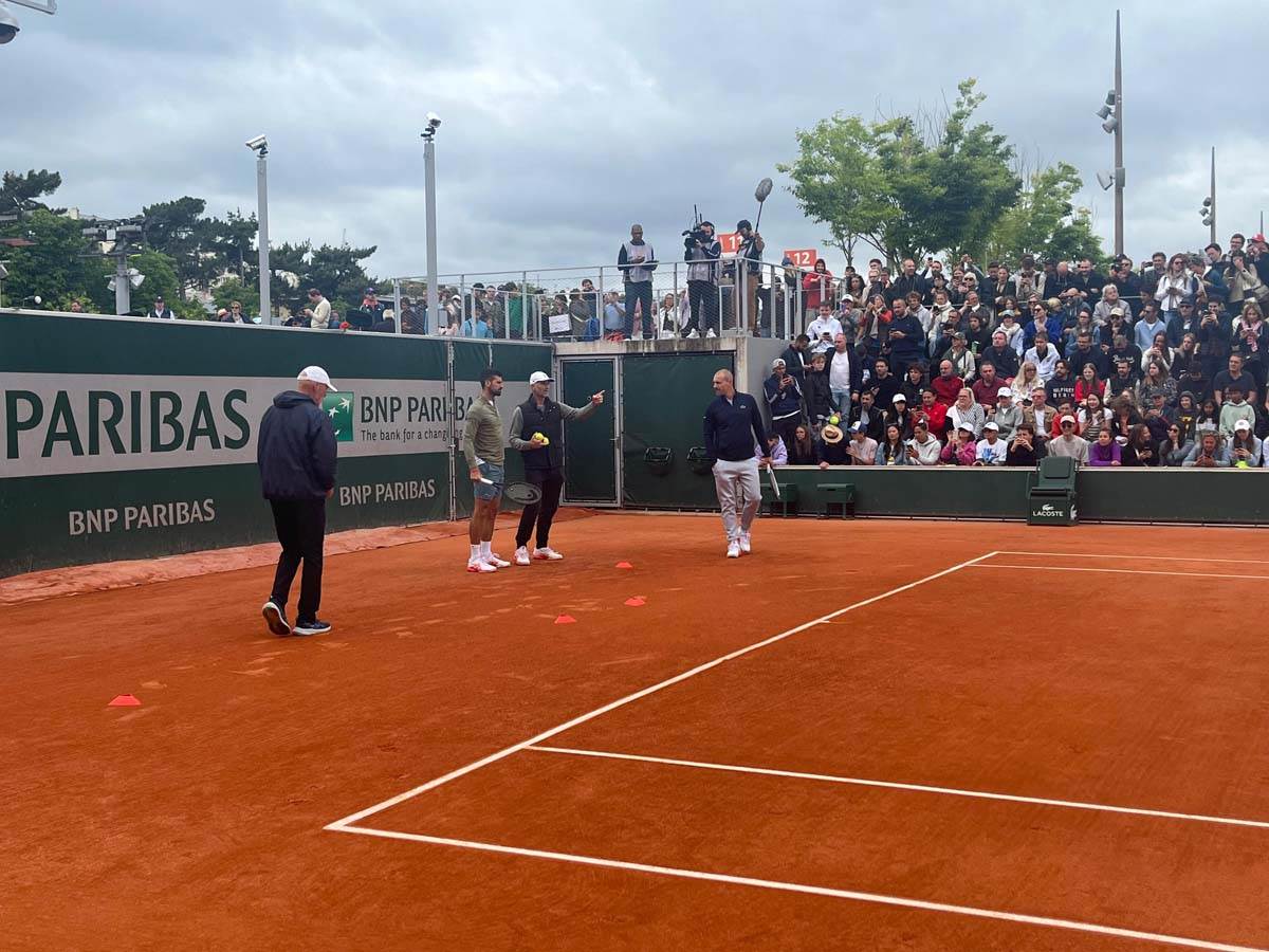 Novak Ðoković trening sa Kristijanom Herisonom 6.jpg