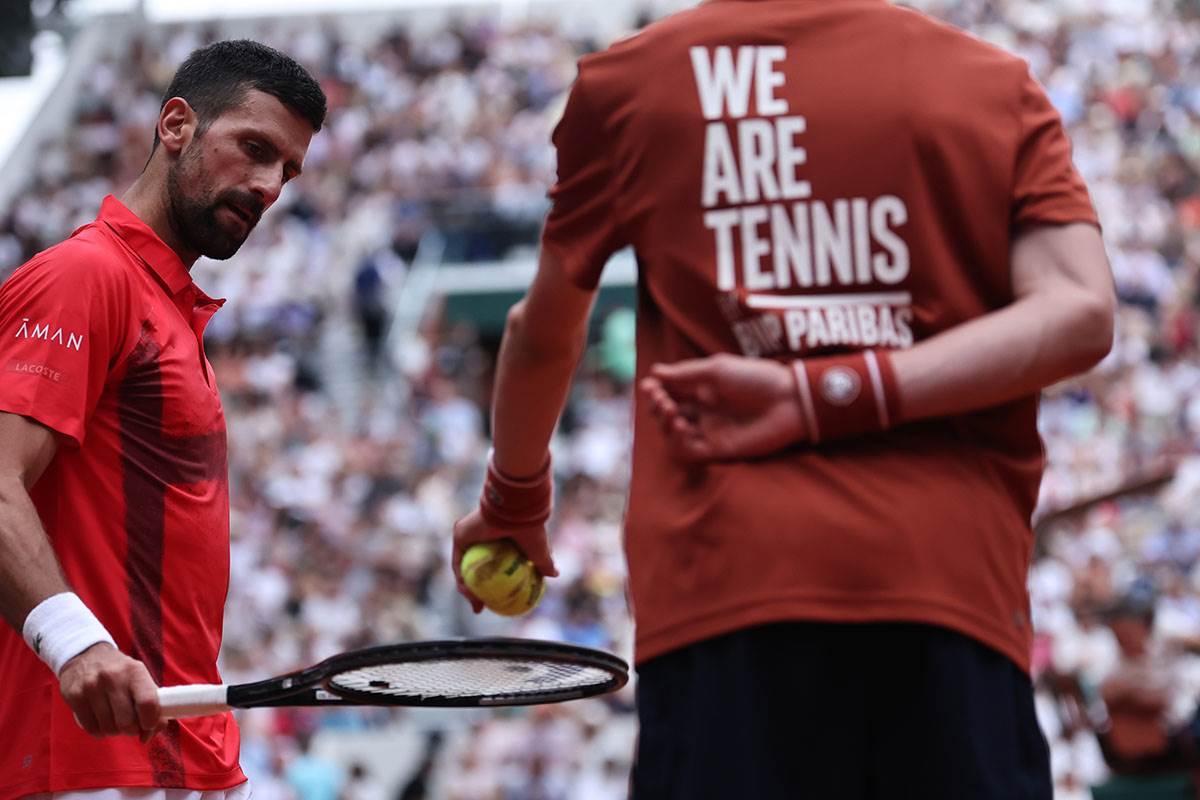 Novak Ðoković - Korentan Mute (2).jpg