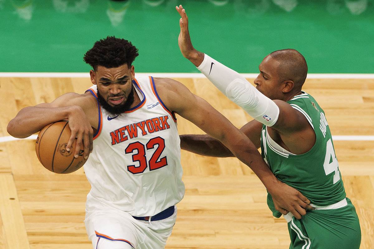 Al Horford u duelu sa Karl-Entonijem Taunsom.