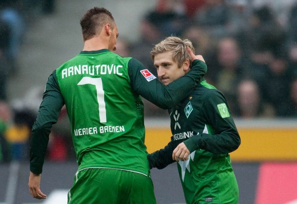 Fudbaleri Verdera Marko Arnautović i Marko Marin slave gol.
