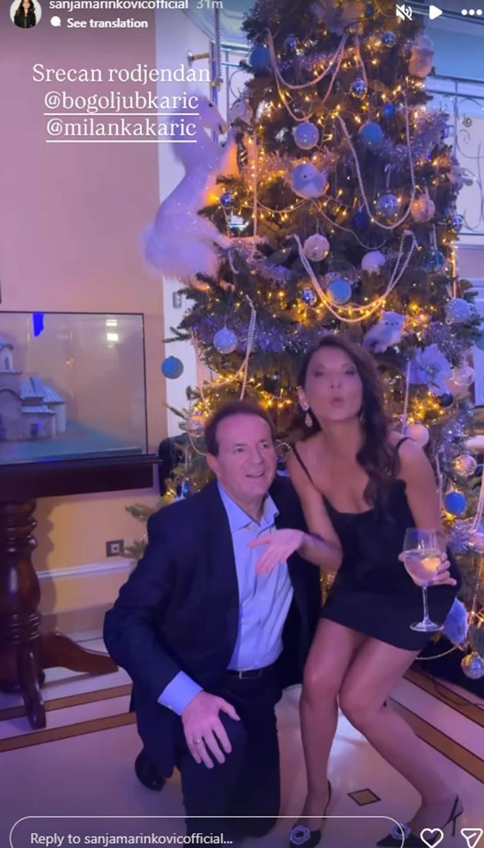Sanja Marinković pozira sa Bogoljubom Karićem 1.jpg