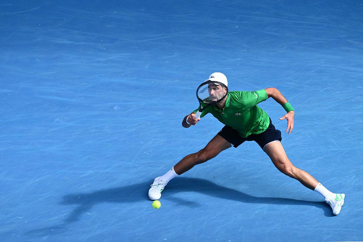 Novak Đoković - Lorenco Muzeti na Australijan openu (3).jpg