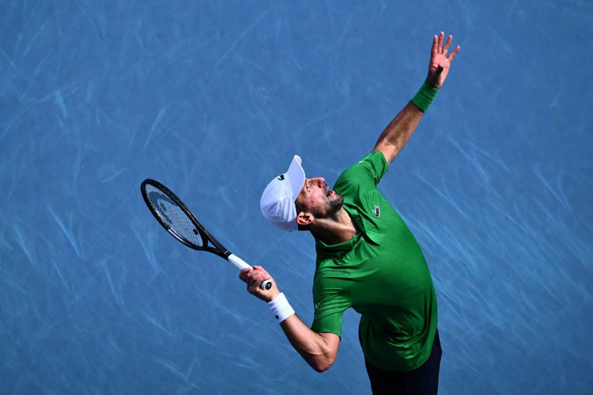 Novak Đoković - Lorenco Muzeti na Australijan openu (2).jpg