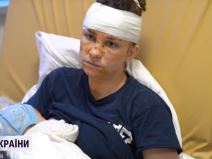 Olga štitla svoju bebu od granatiranja 2.jpg