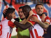 Fudbaler Crvene zvezde Jegor Prucev slavi sa Radonjićem, Krunićem i Endiajeom.