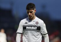 Milan Vukotić u belom dresu Partizana.