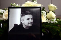 Fotografija Edina Avdića na komemoraciji u Beogradu u hotelu Kraun Plaza