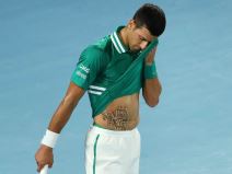 novak djokoic povreda flaster zavoj stomak australijan open foto