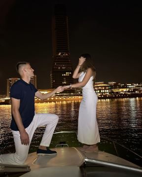 Photo by @dehilarusevic on July 17, 2024. May be an image of 2 people, people kissing, boat, yacht and outdoors..jpg