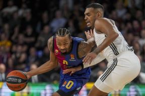 Košarkaš Real Madrida Ksavijer Rejtan-Majs protiv Kevina Pantera.