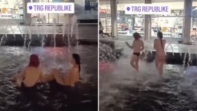 Gole devojke se ljube u fontani na Trgu Republike