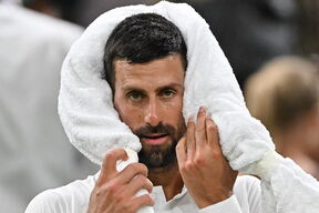 Novak Đoković sa peškirom oko glave.