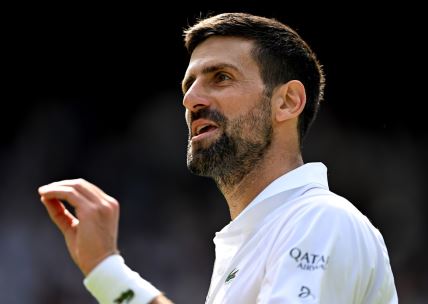 Novak Đoković na meču protiv Aleksa de Minora na Vimbldonu