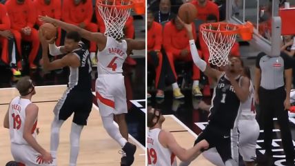 Viktor Vembanjama zakucava loptu u koš.