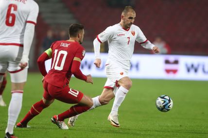 Driton Camaj i Dušan Tadić na utakmici Srbije i Crne Gore