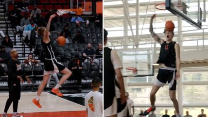 Mika Murinen zakucava loptu u koš.