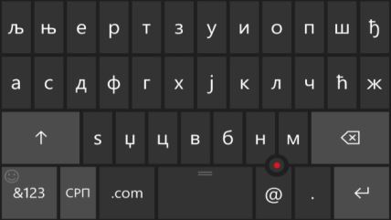 Ćirilična tastatura sa kursorom na Windows 10 Mobile.