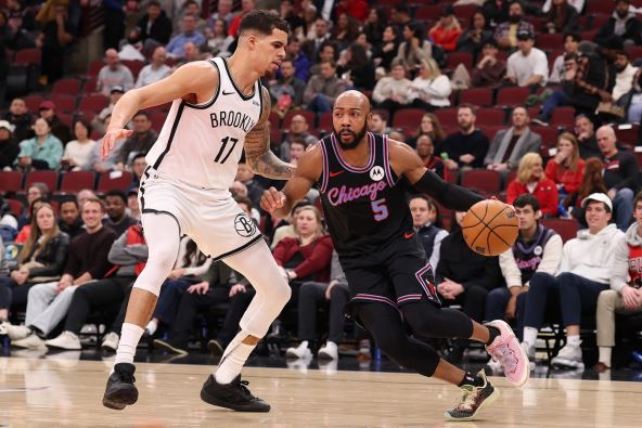 Majkl Porter Džunior igra odbranu protiv Čikago Bulsa