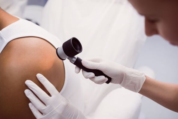 doctor-removing-mole-with-laser-treatment copy.jpg