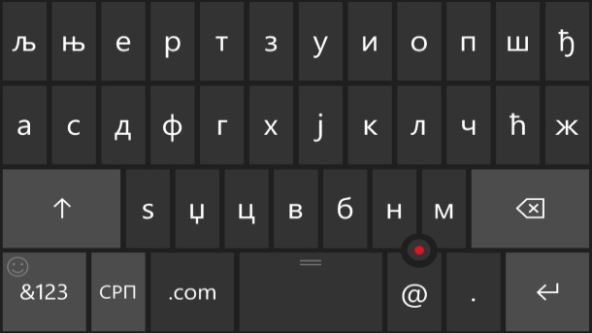 Ćirilična tastatura sa kursorom na Windows 10 Mobile.