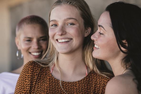 Happy confident girlfriends