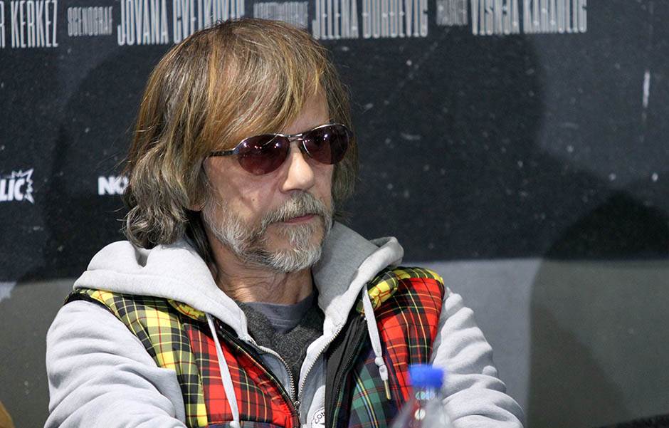 Srđan Žika Todorović bez zuba i sa zavojem na čelu