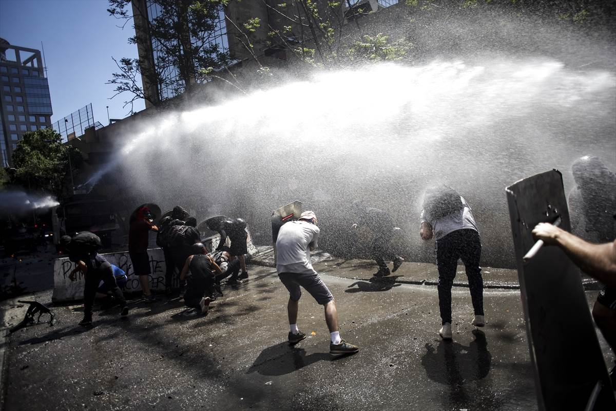 Čile protesti demonstracije polcija neredi fotografije
