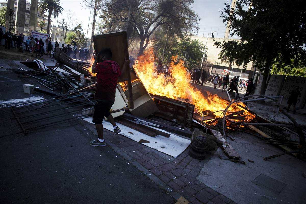 Čile protesti demonstracije polcija neredi fotografije