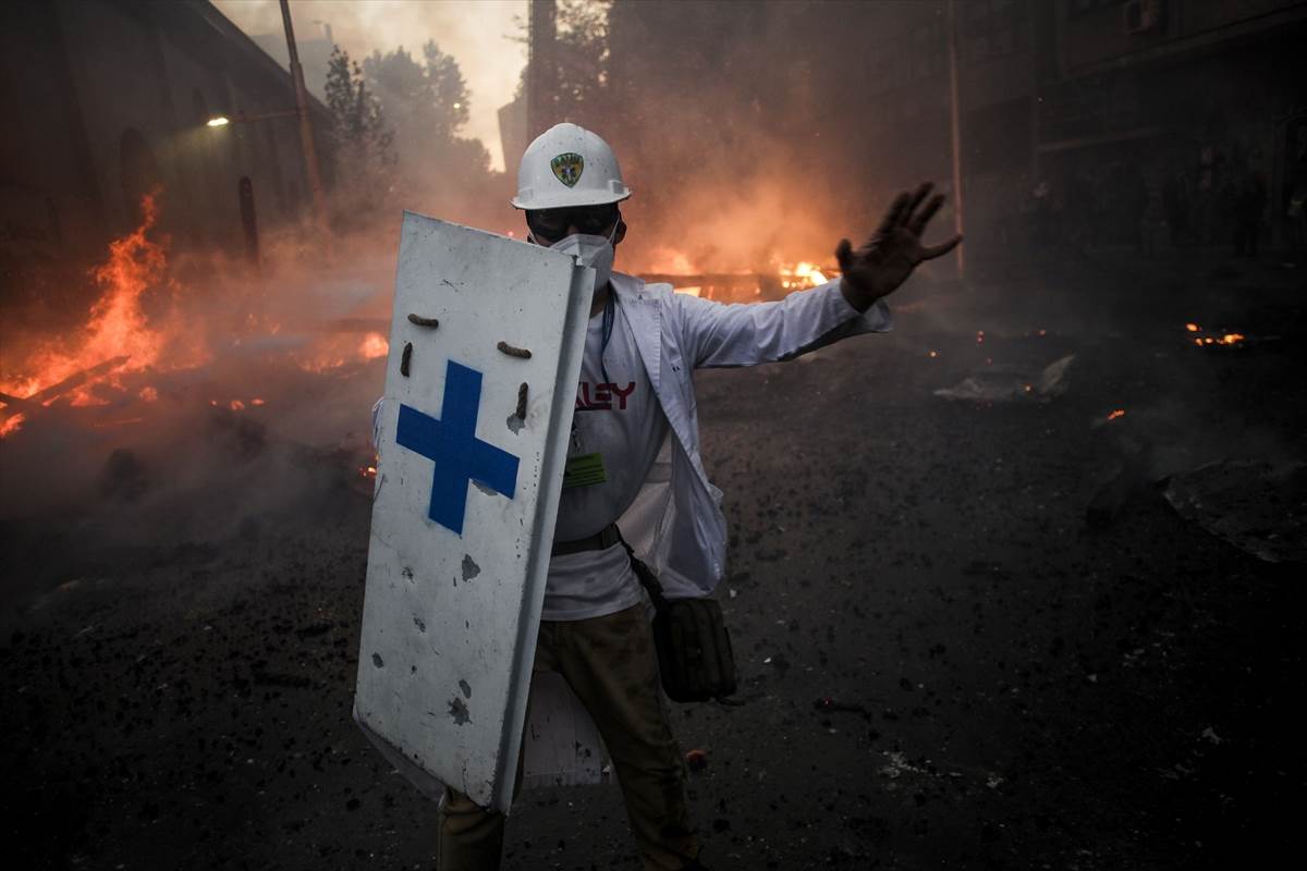 Čile protesti demonstracije polcija neredi fotografije