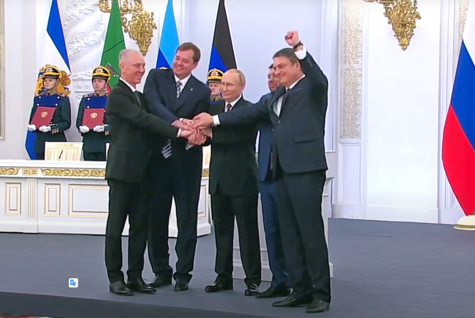 Putin Rusija potpisivanje pripajanja.jpg