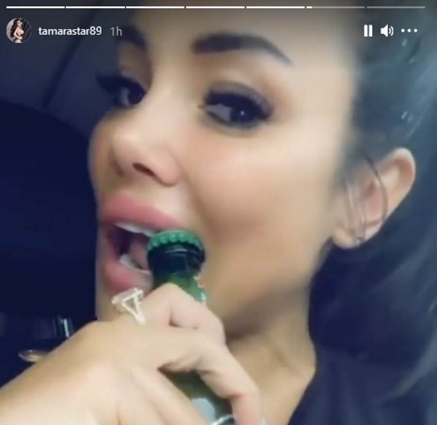 tamara djuric otvara flasu piva zubima foto